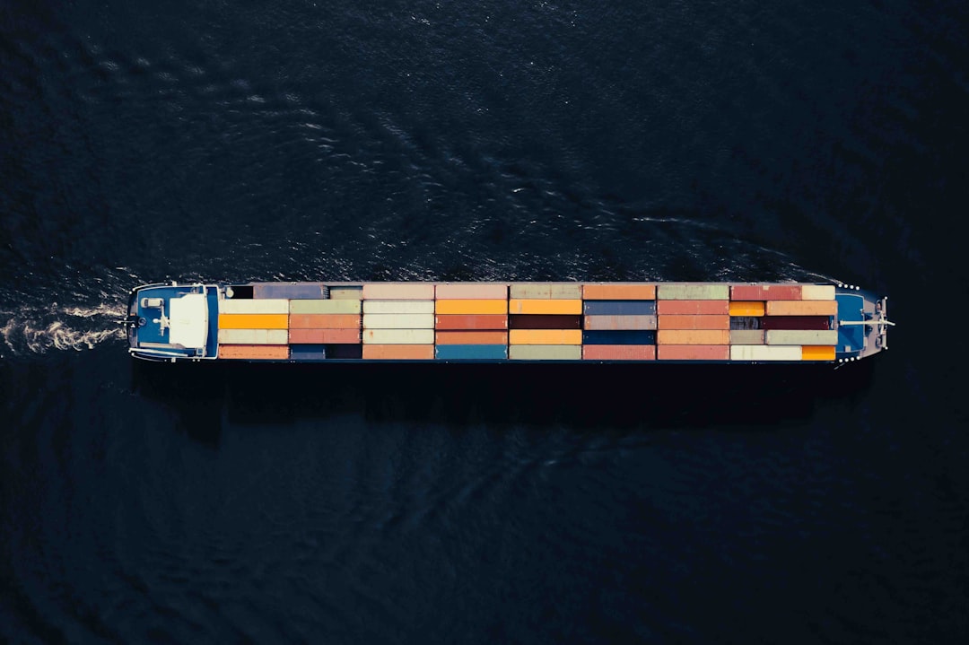 a-large-container-ship-in-a-body-of-water-yfqfmji31fy
